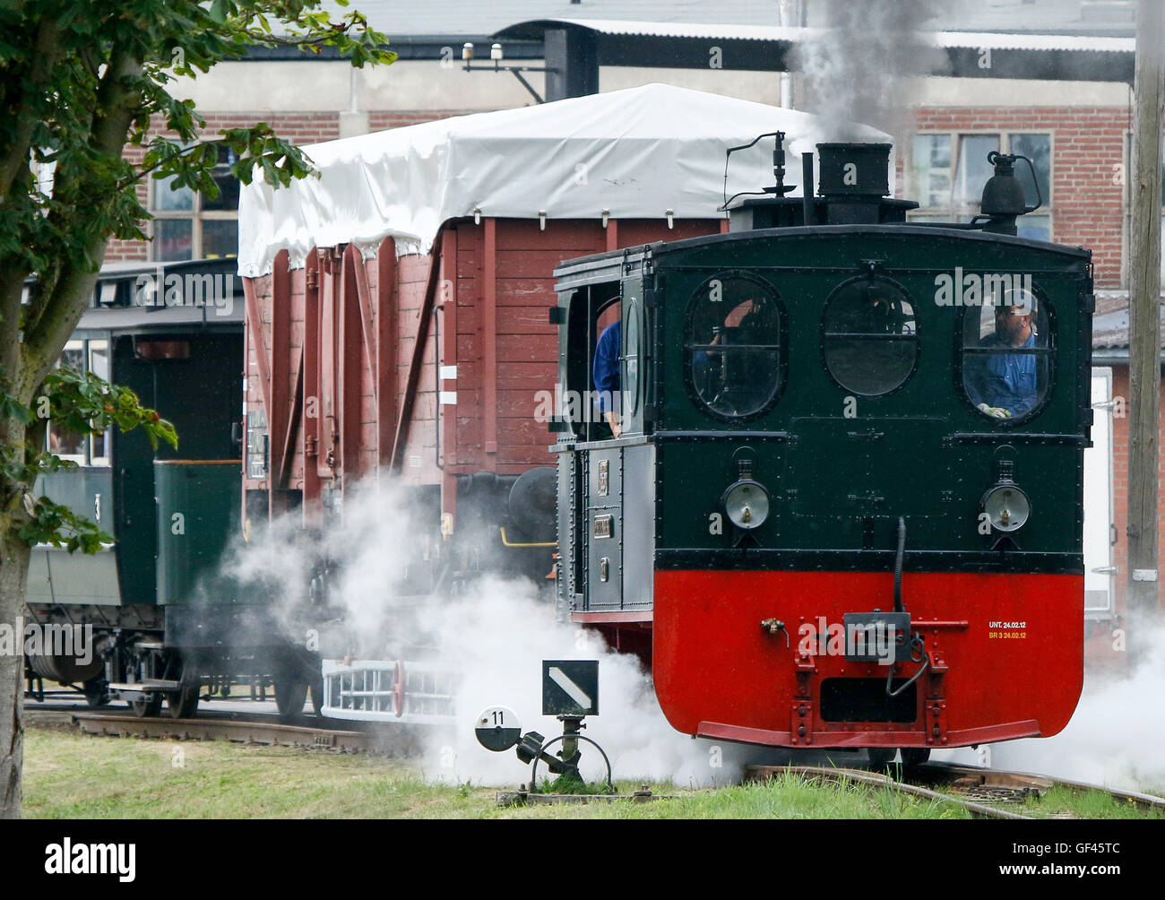 The historical steam engine 'Plettenberg' can be seen during a parade for the 50th anniversary of the local museum engines in Bruchhausen-Vilsen, Germany, 29 July 2016. For one week, historical trains will be travelling between Bruchhausen-Vilsen and Asendorf as well as Syke and Eystrup for the celebration of the anniversary. PHOTO: FOCKE STRANGMANN/dpa Stock Photo