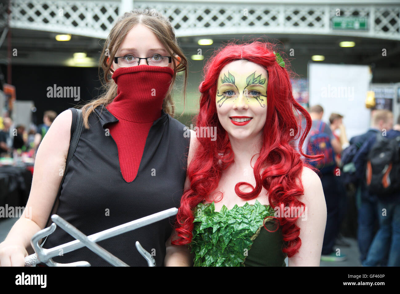 Olympia, London, UK. 29th July, 2016. Katy Hampshire dressed as poison Ivy  and Joanne Carver as Elektra. London Film \u0026 Comic Con takes place in  Olympia from 29 to 30 July 2016., image size:1300x956