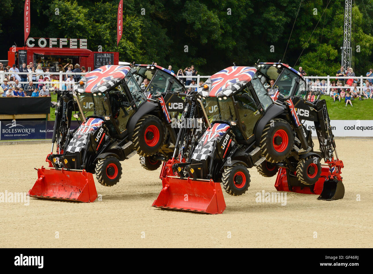 Bolesworth, Cheshire, UK. 29th July 2016. JCB diggers performing in the Showground Arena. The event is the brainchild of Chris Evans and features 3 days of cars, music and entertainment with profits being donated to the charity Children in Need. Credit:  Andrew Paterson/Alamy Live News Stock Photo