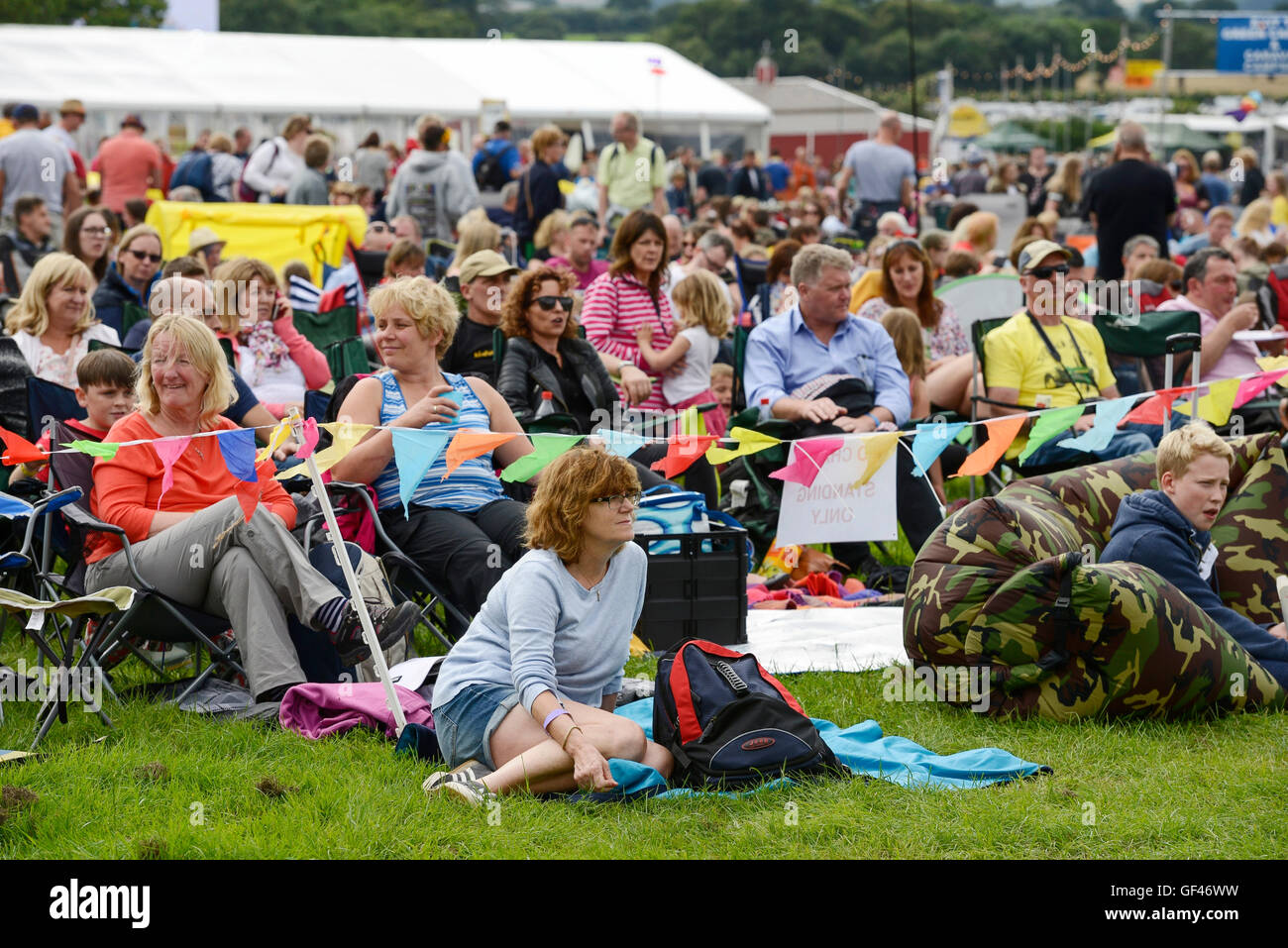 Bolesworth, Cheshire, UK. 29th July 2016. Fans waiting for Texas to come to the Main stage. The event is the brainchild of Chris Evans and features 3 days of cars, music and entertainment with profits being donated to the charity Children in Need. Credit:  Andrew Paterson/Alamy Live News Stock Photo