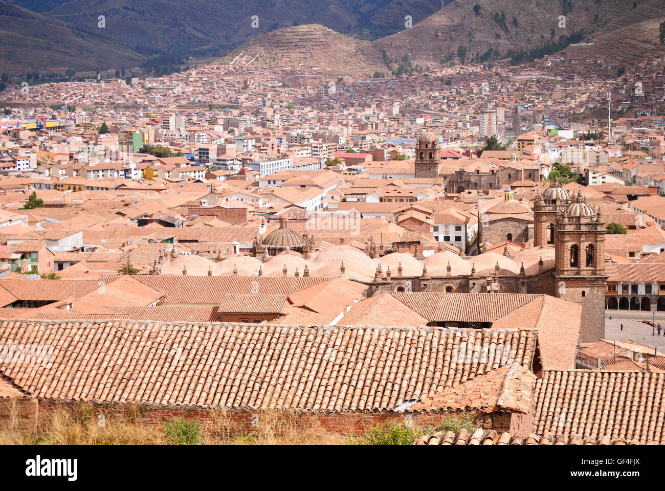 The sea of orange tiled roof of Cuzco city Stock Photo