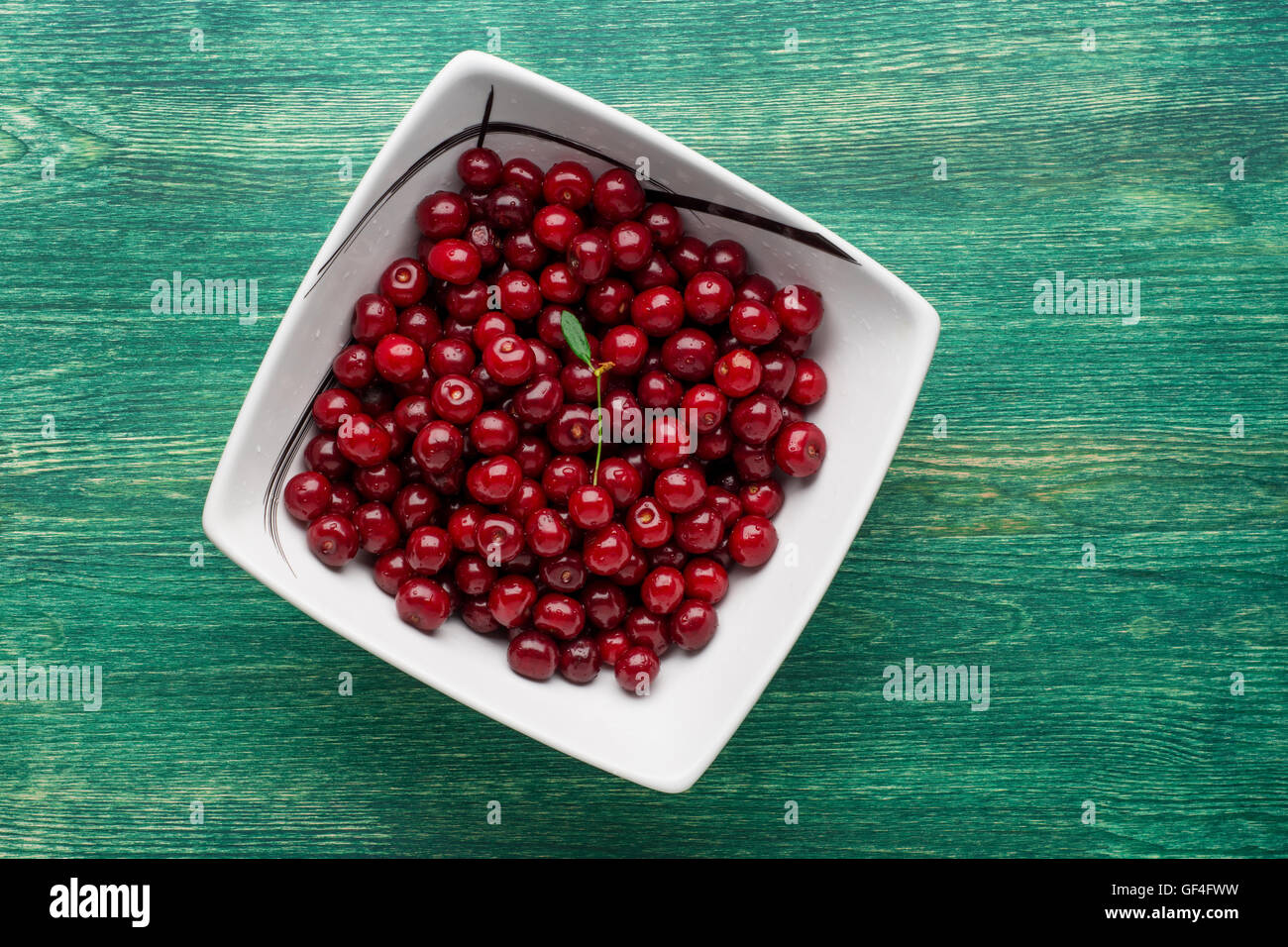 Red ripe delicious cherries background Stock Photo - Alamy