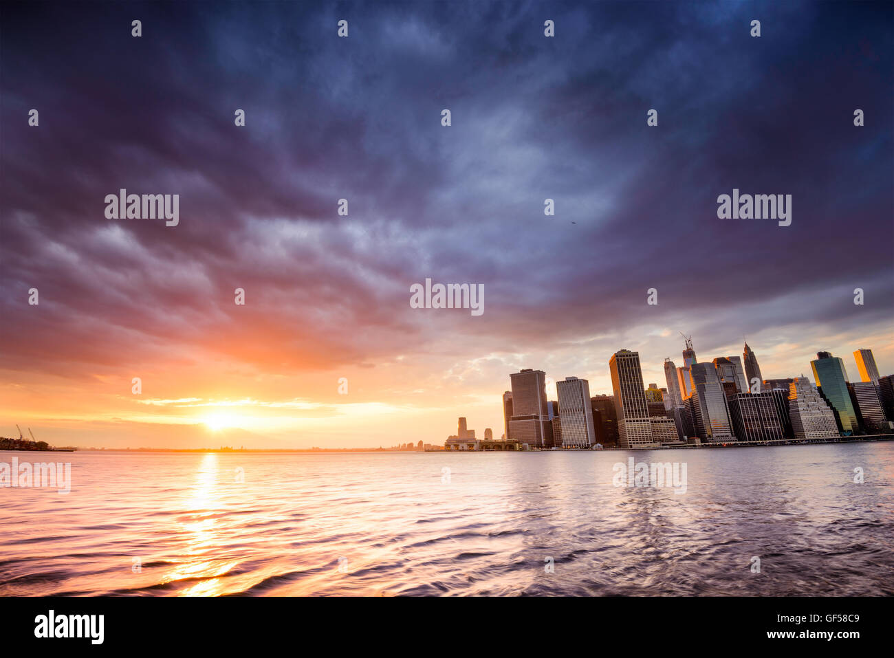 Manhattan skyline across the East River in New York City Stock Photo ...