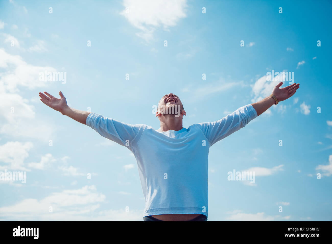 The man held out his hands to the sky. Freedom Stock Photo - Alamy