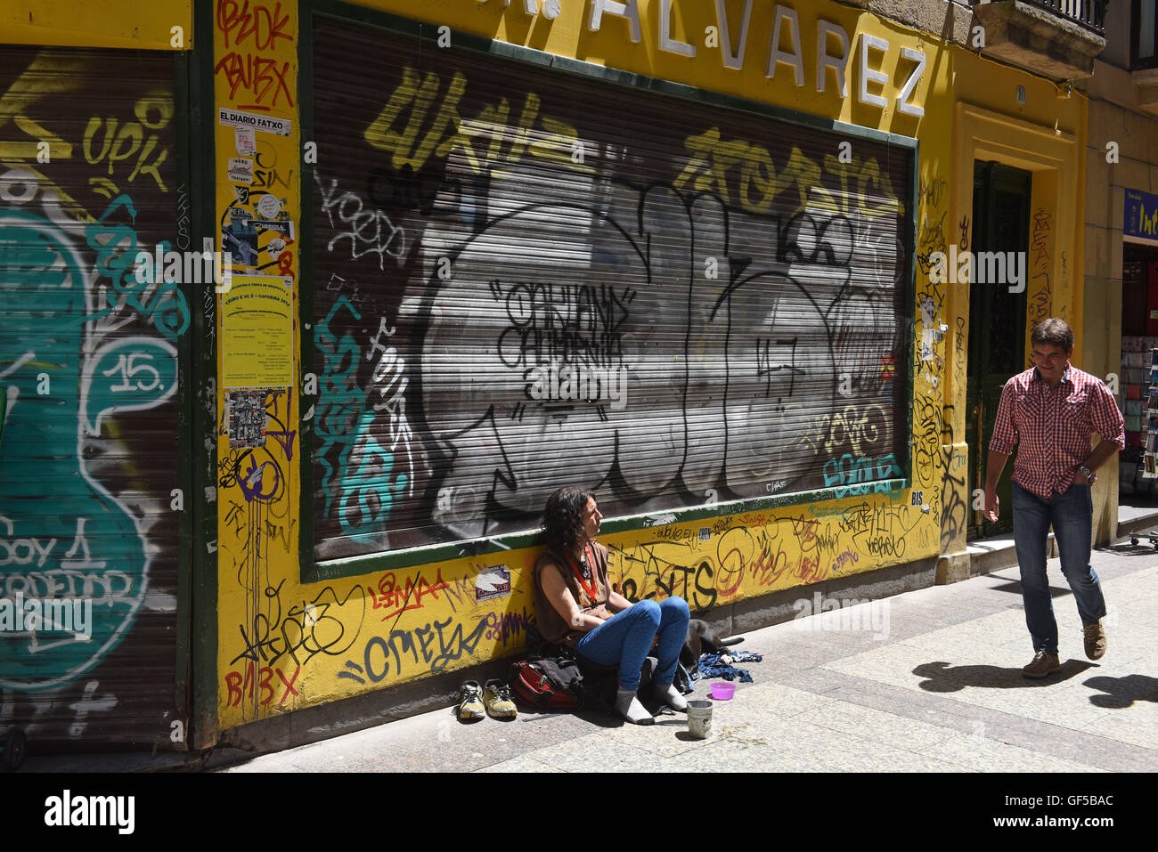 Beggar begging in street San Sebastian Donostia Spain basque region country Stock Photo