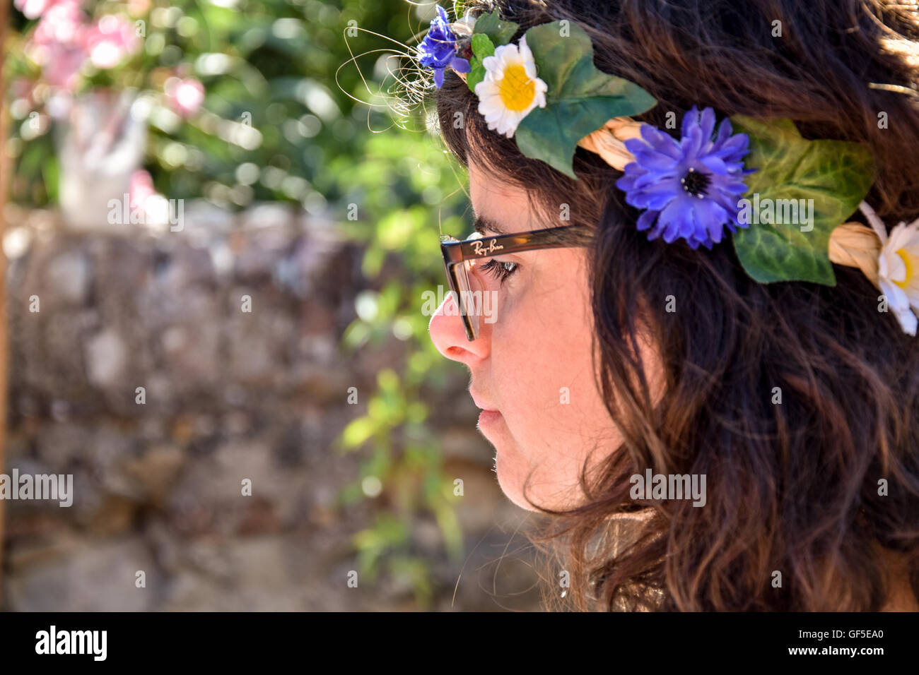 girl with a wreath of flowers Stock Photo
