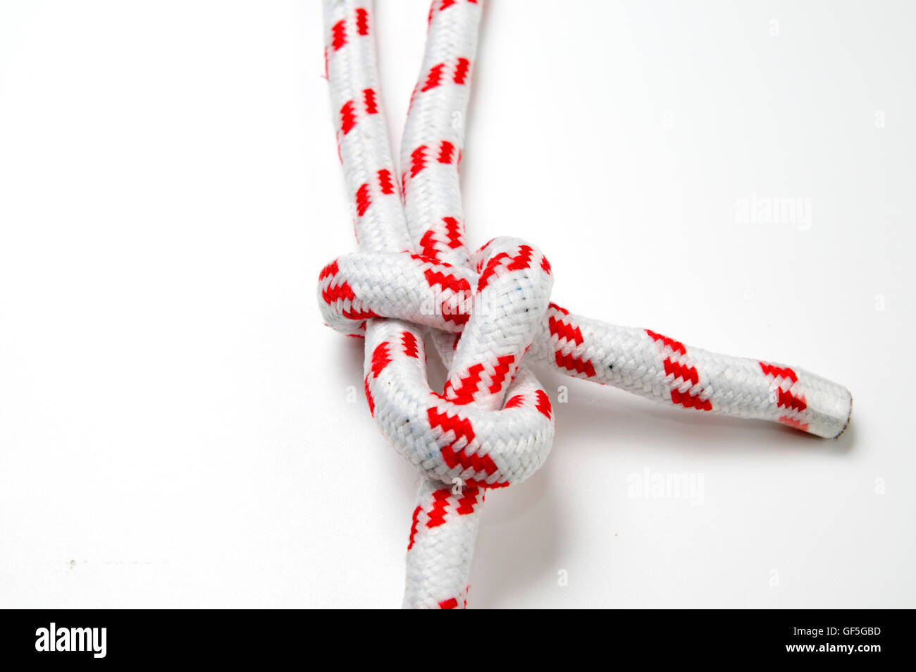 The Sheet Bend knot on white background for joining two ropes of