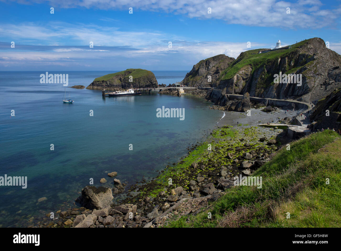 Boat at Jetty in Harbour and coast at Lundy Island,Bristol Channel,Devon,England Stock Photo