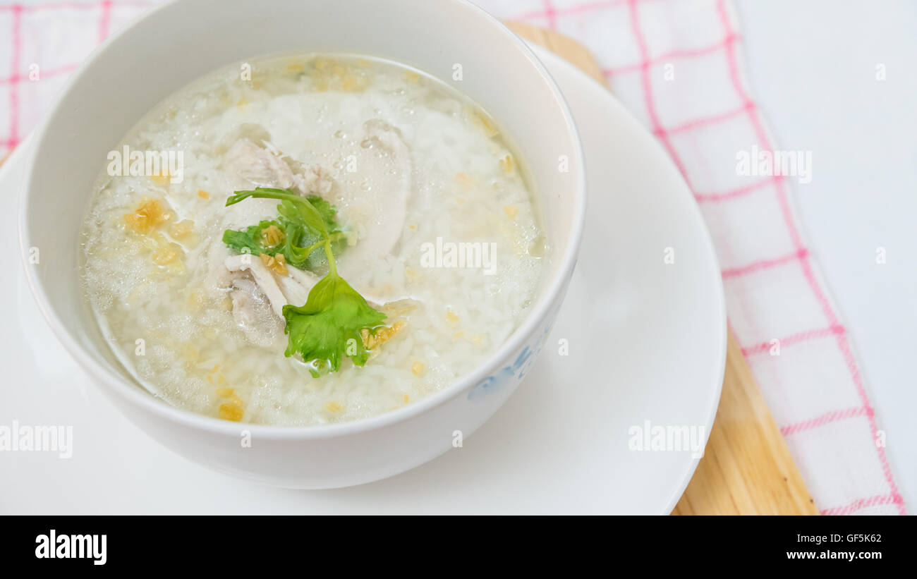 Thai style rice boiled with pork in bowl Stock Photo - Alamy
