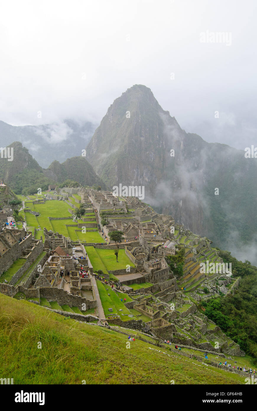 Machu Picchu and the misty Andes Mountains Stock Photo - Alamy