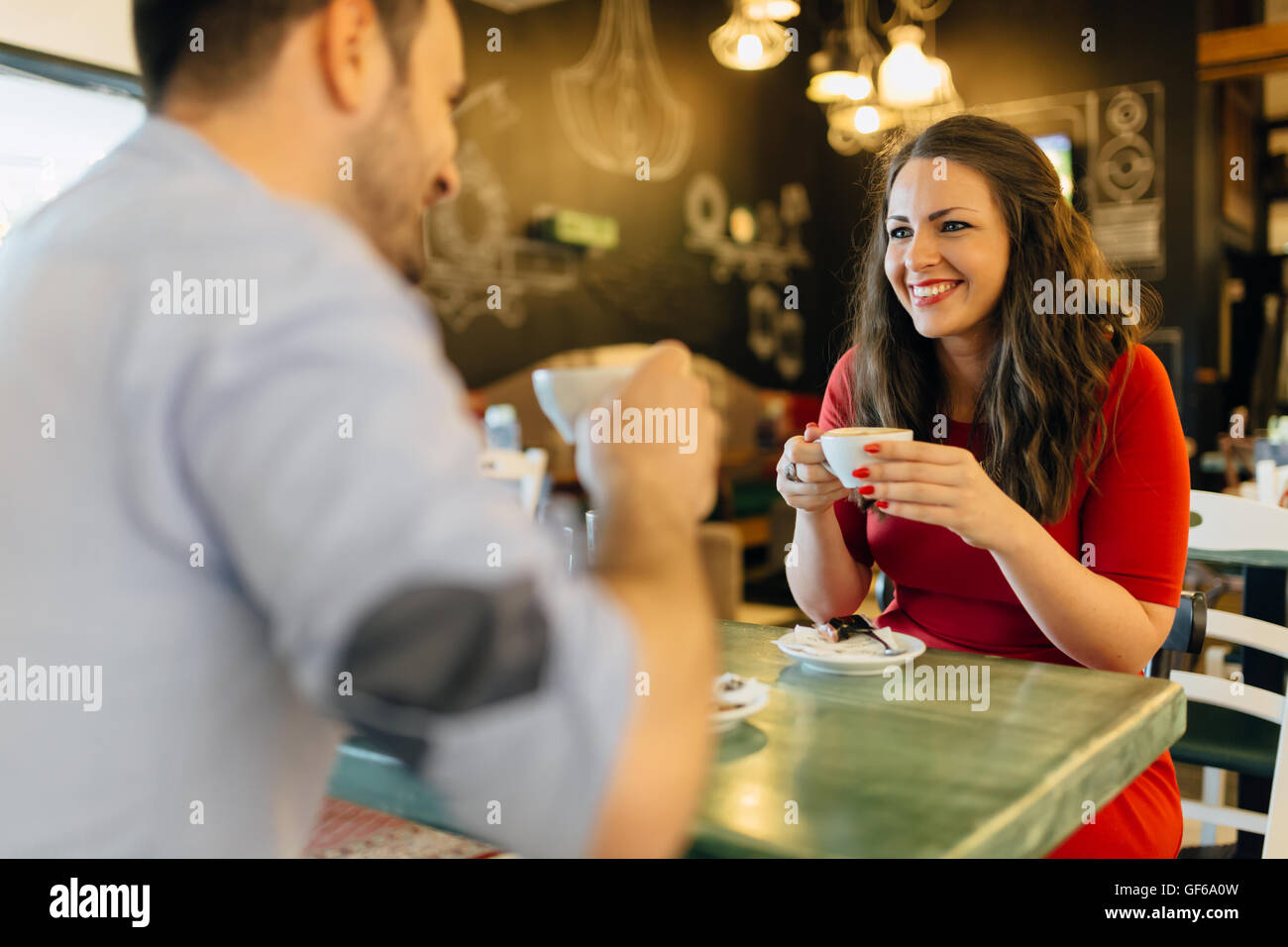 Romantic couple having a coffee in cafe Stock Photo Alamy