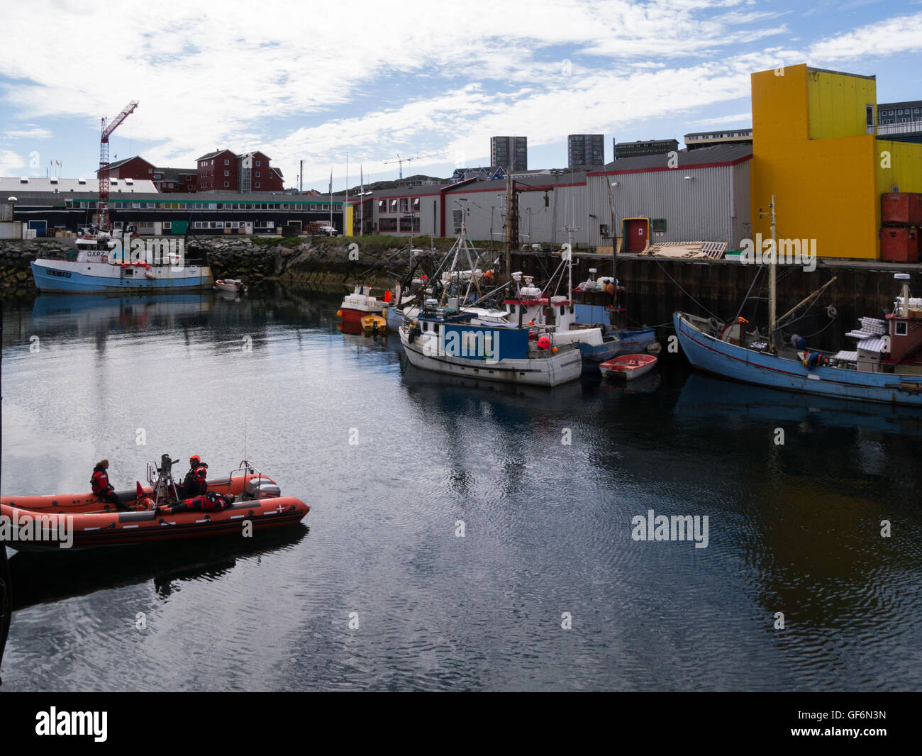 Fishing boats in Nuuk harbour capital city of Greenland and country's ...