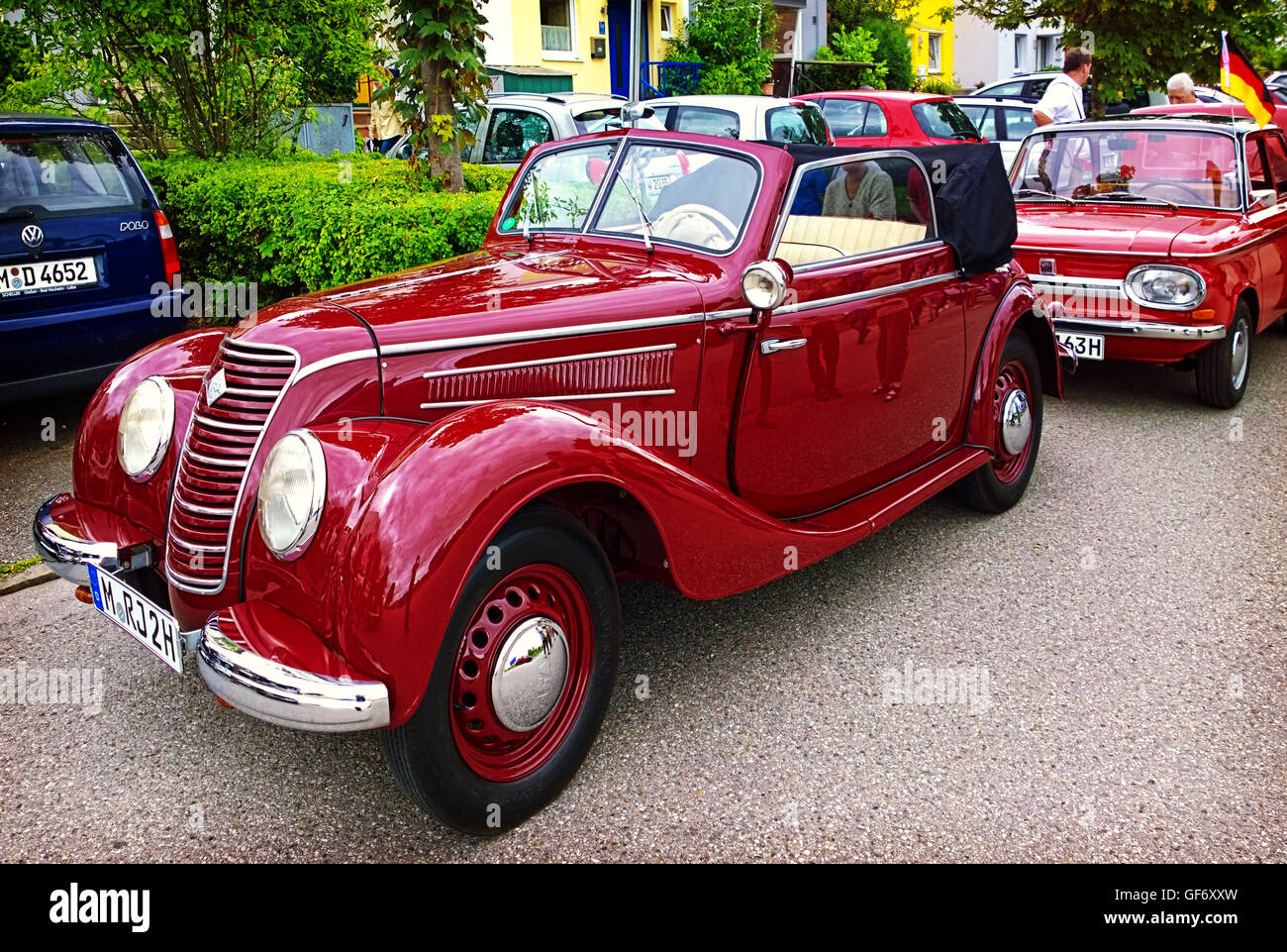 GARCHING, GERMANY - red purple shiny old IFA 2 door cabriolet produced in GDR in the years 1949-1956 Stock Photo