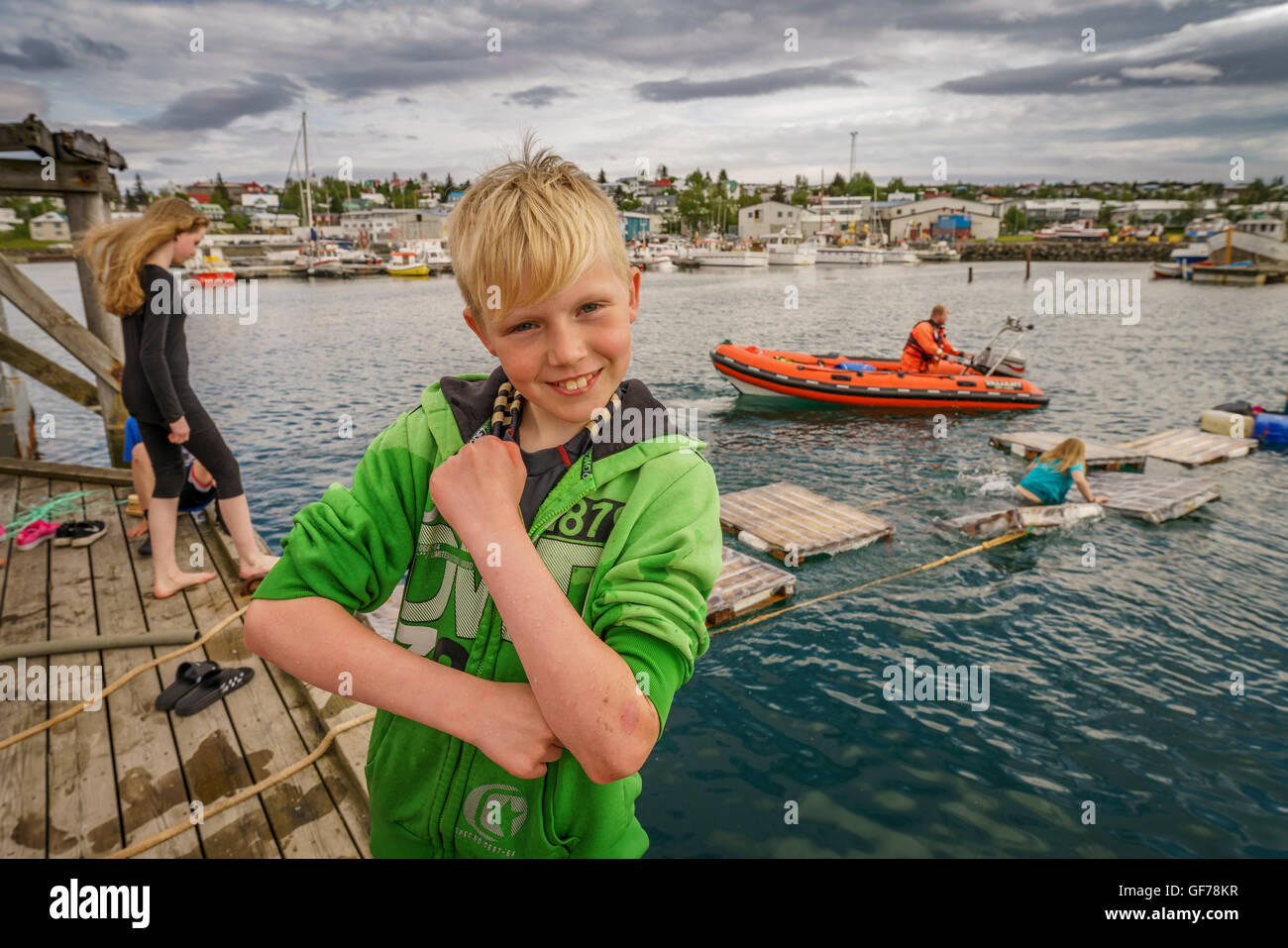 Boy making a fist at the Annual Seaman's Festival, Hafnarfjordur, Iceland Stock Photo