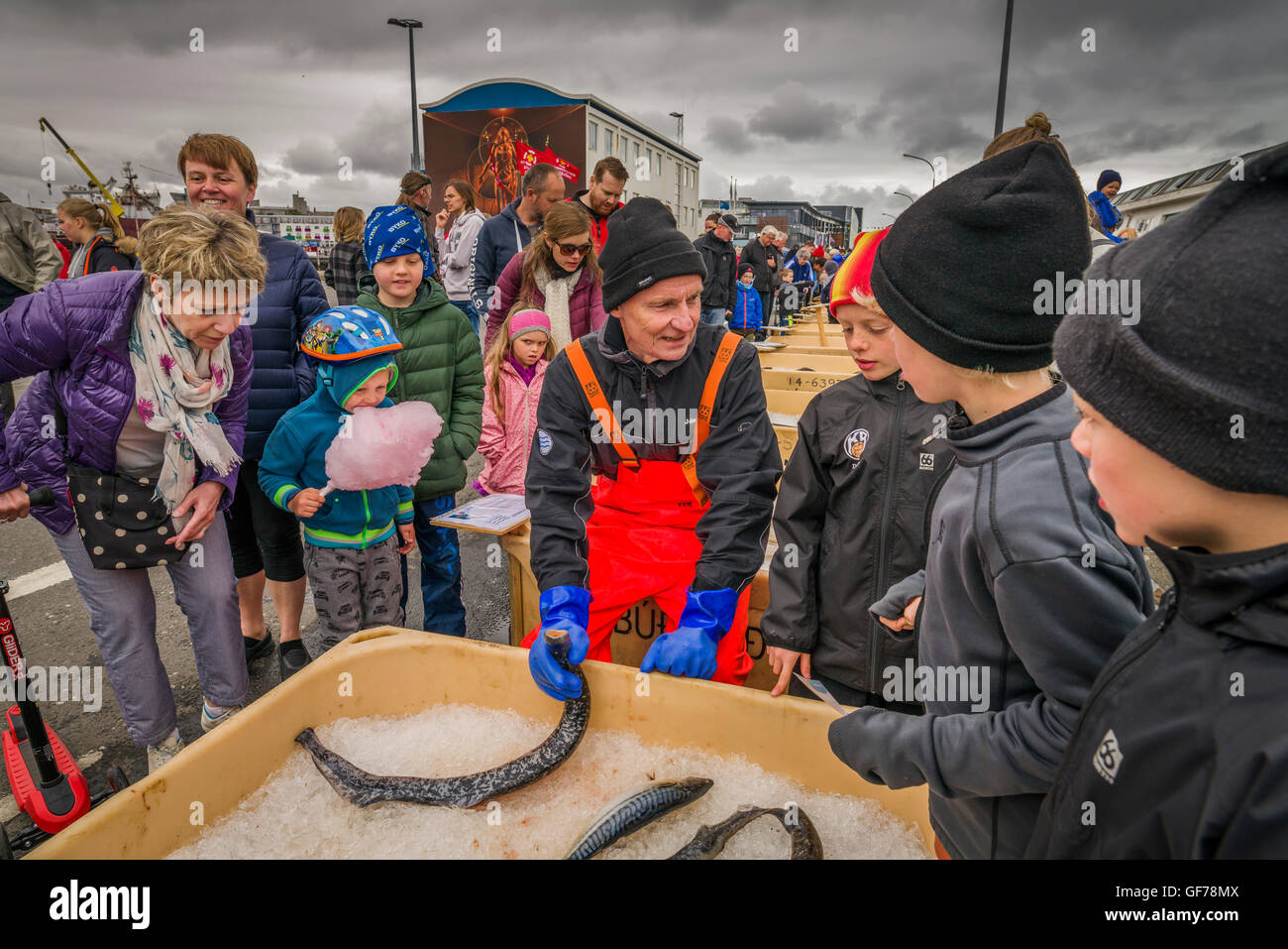 Fisherman showing fish at The Annual Seaman's Festival, Reykjavik, Iceland Stock Photo