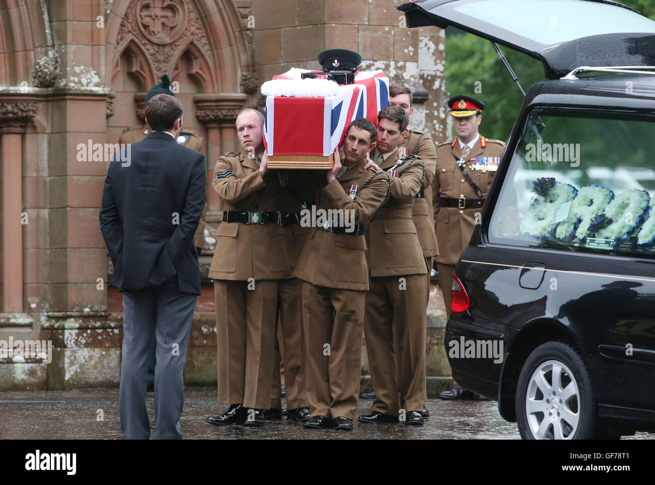 The coffin of Corporal Josh Hoole is taken from Crichton Memorial church in Dumfries following his funeral. Stock Photo