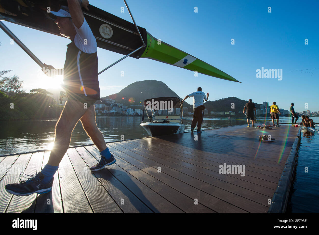 RIO DE JANEIRO - MARCH 22, 2016: After training, Brazilian rowers carry ...