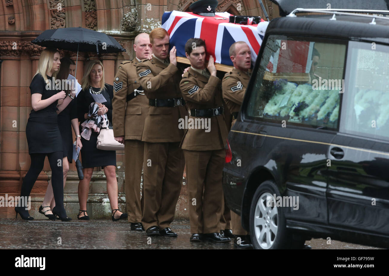 The coffin of Corporal Josh Hoole is carried from Crichton Memorial church in Dumfries following his funeral. Stock Photo