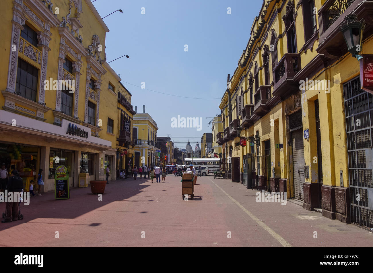 Lima, Peru -December 31, 2013: Street view of Lima old town with traditional colorful houses and wooden balcony. Stock Photo