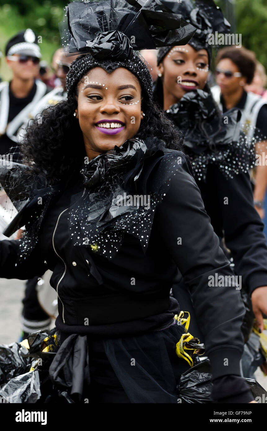 Two black female dancers taking part in the Carnival Parade, part of the Edinburgh Jazz Festival. Stock Photo