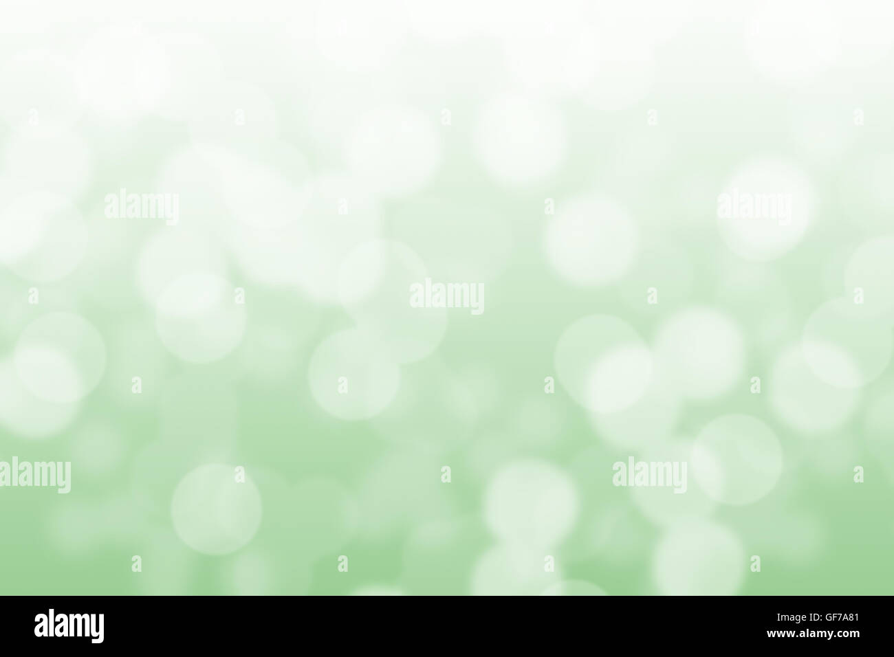 Abstract circular light green and white bokeh background Stock Photo