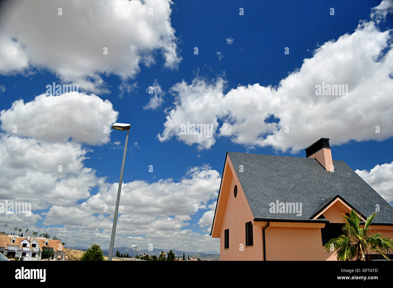 modern construction and blue sky with clouds Stock Photo - Alamy