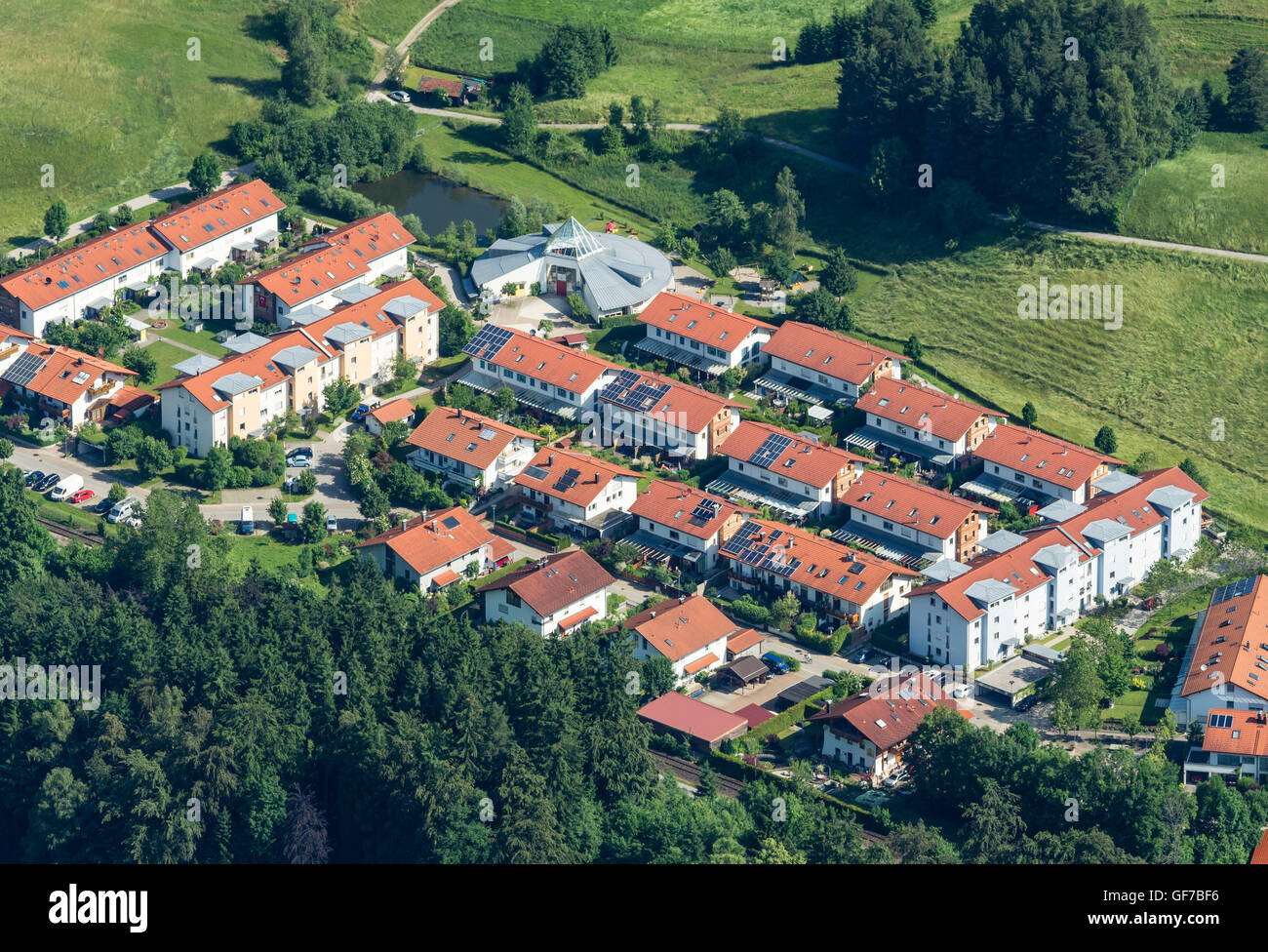 Aerial view, housing area, Kindergarten, surrounded by green meadows, Füssen, Bavaria, Germany Stock Photo