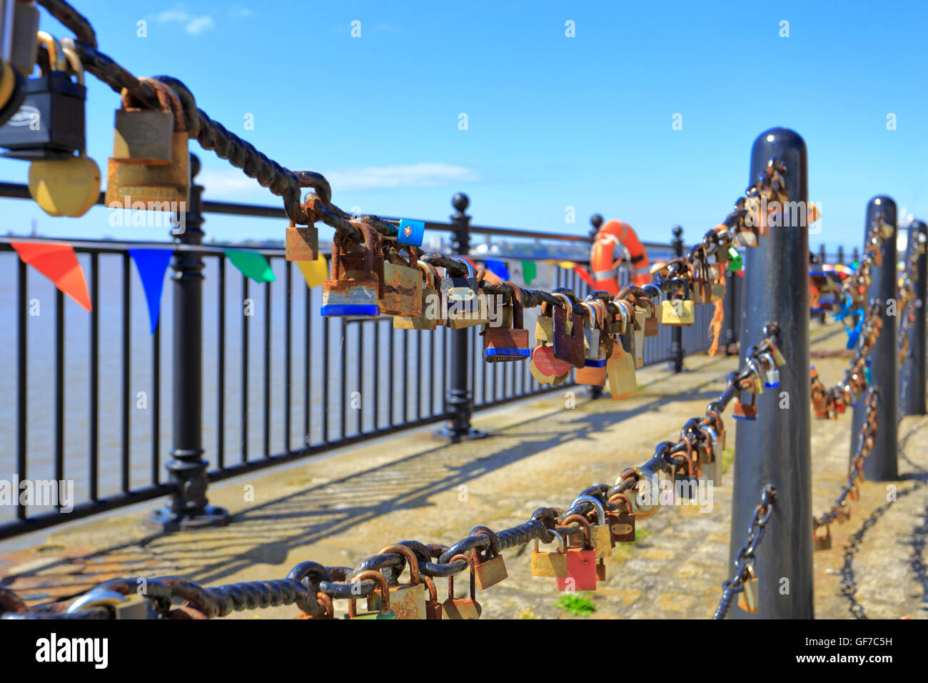 Love Locks on chain fencing promenade, Albert Dock, Liverpool, Merseyside, England, UK. Stock Photo