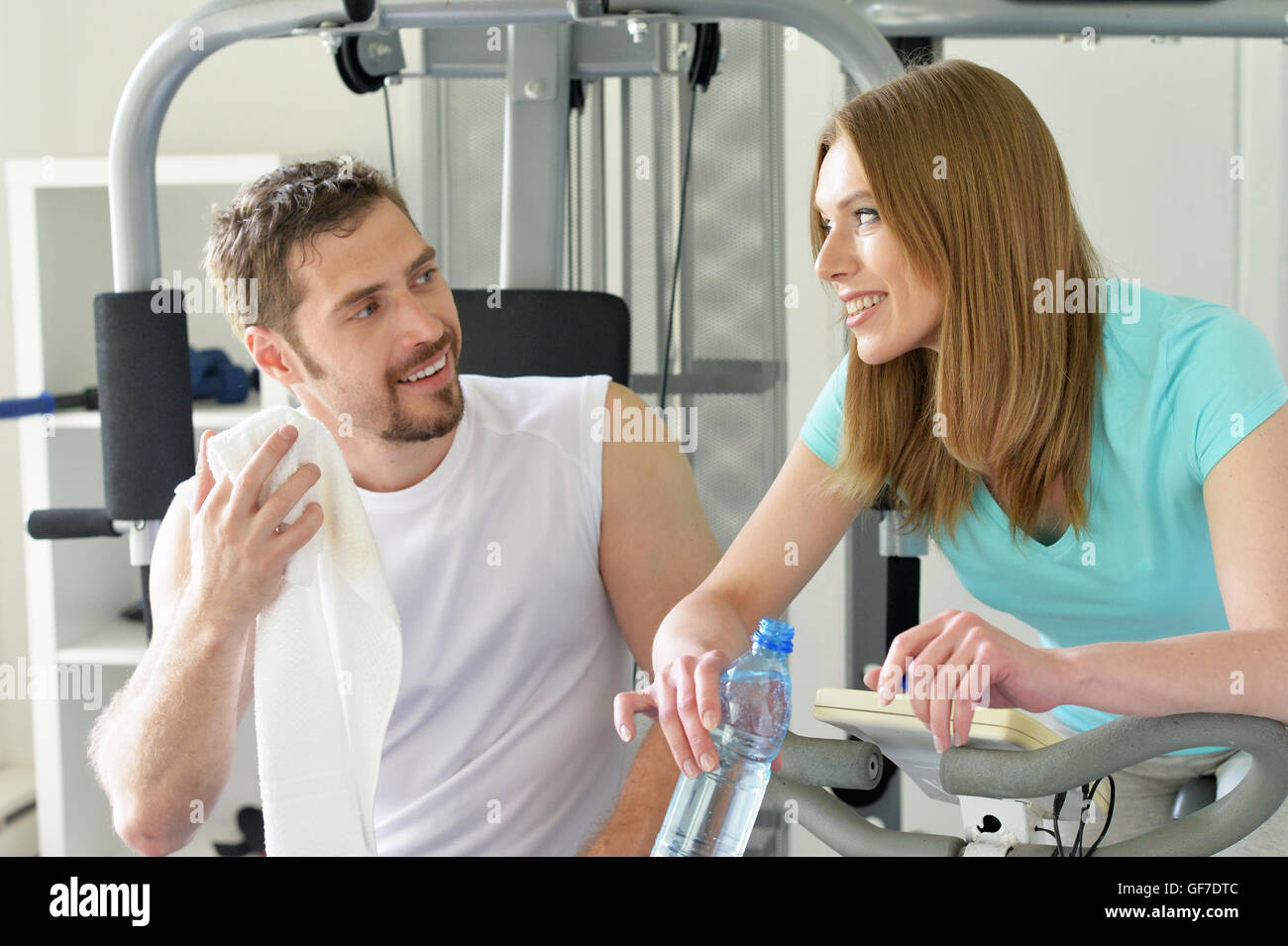 Attractive couple at the gym Stock Photo - Alamy
