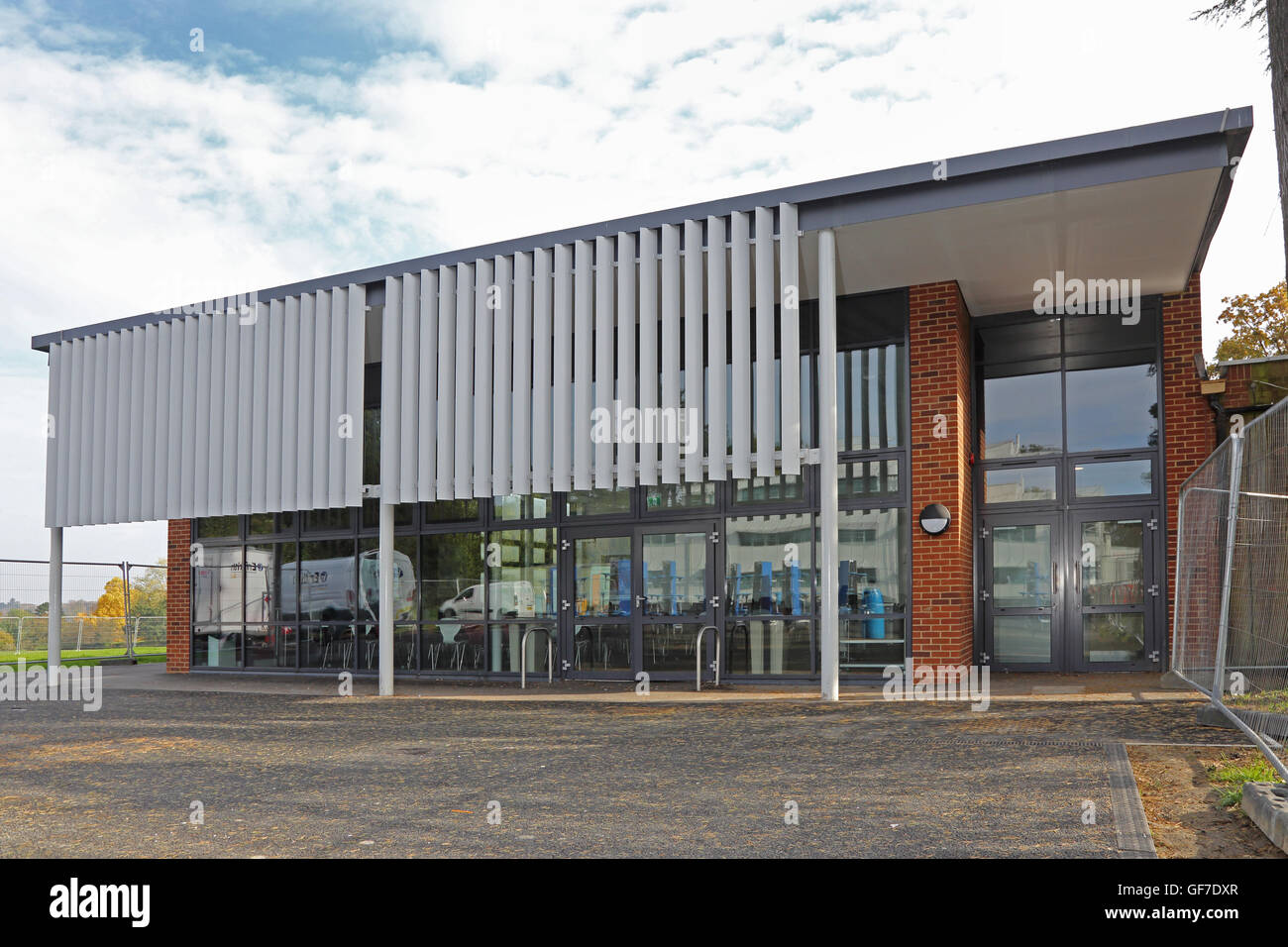 fixed vertical louvres provide sun shade for a large, southfacing