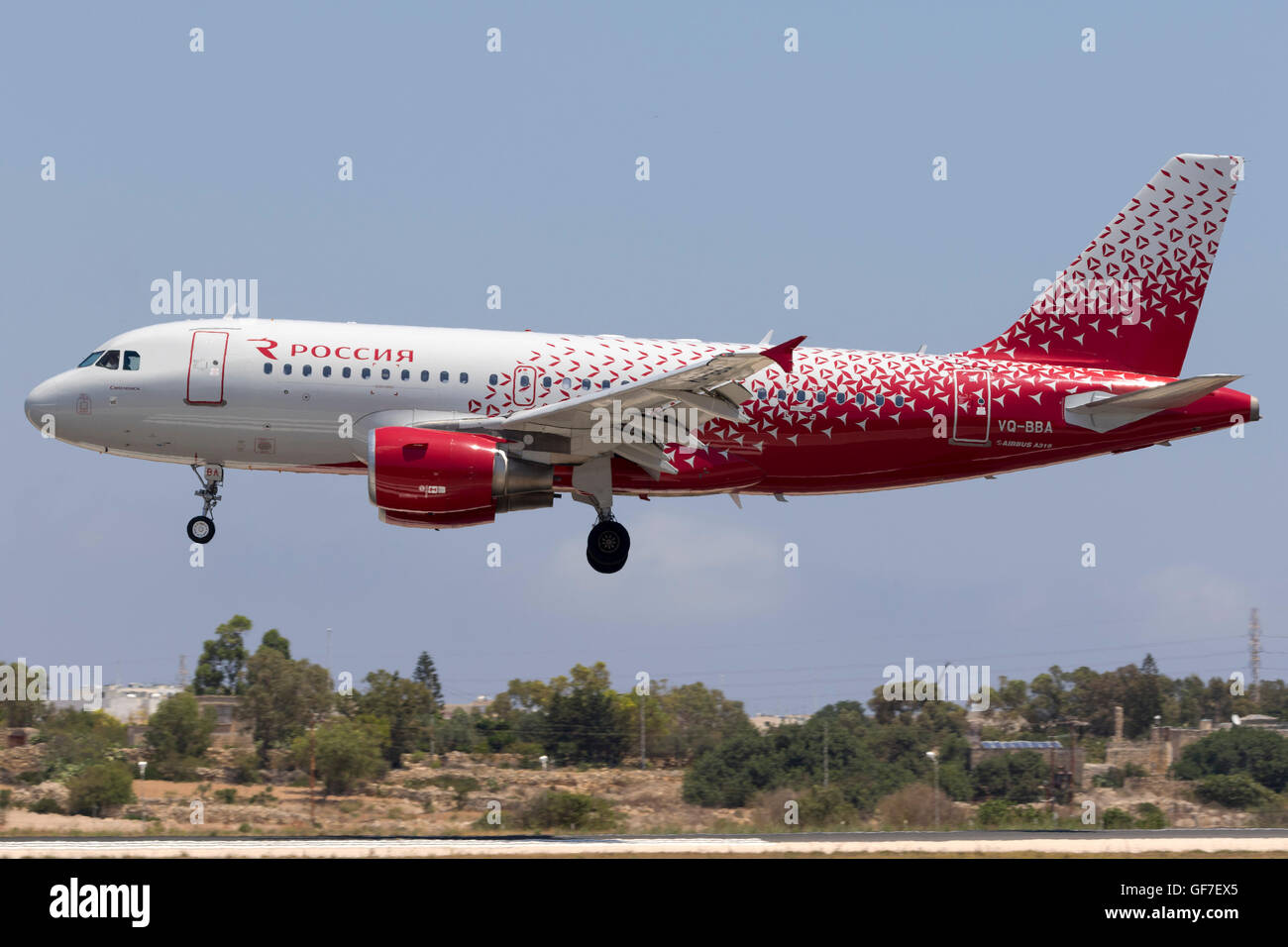 Rossiya Airlines Airbus A319-112 [VQ-BBA] on finals runway 31 in the scorching midday heat of the Maltese summer. Stock Photo
