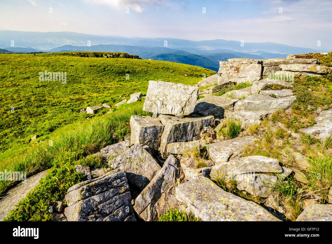 white sharp stones on the hillside on top of mountain range Stock Photo ...