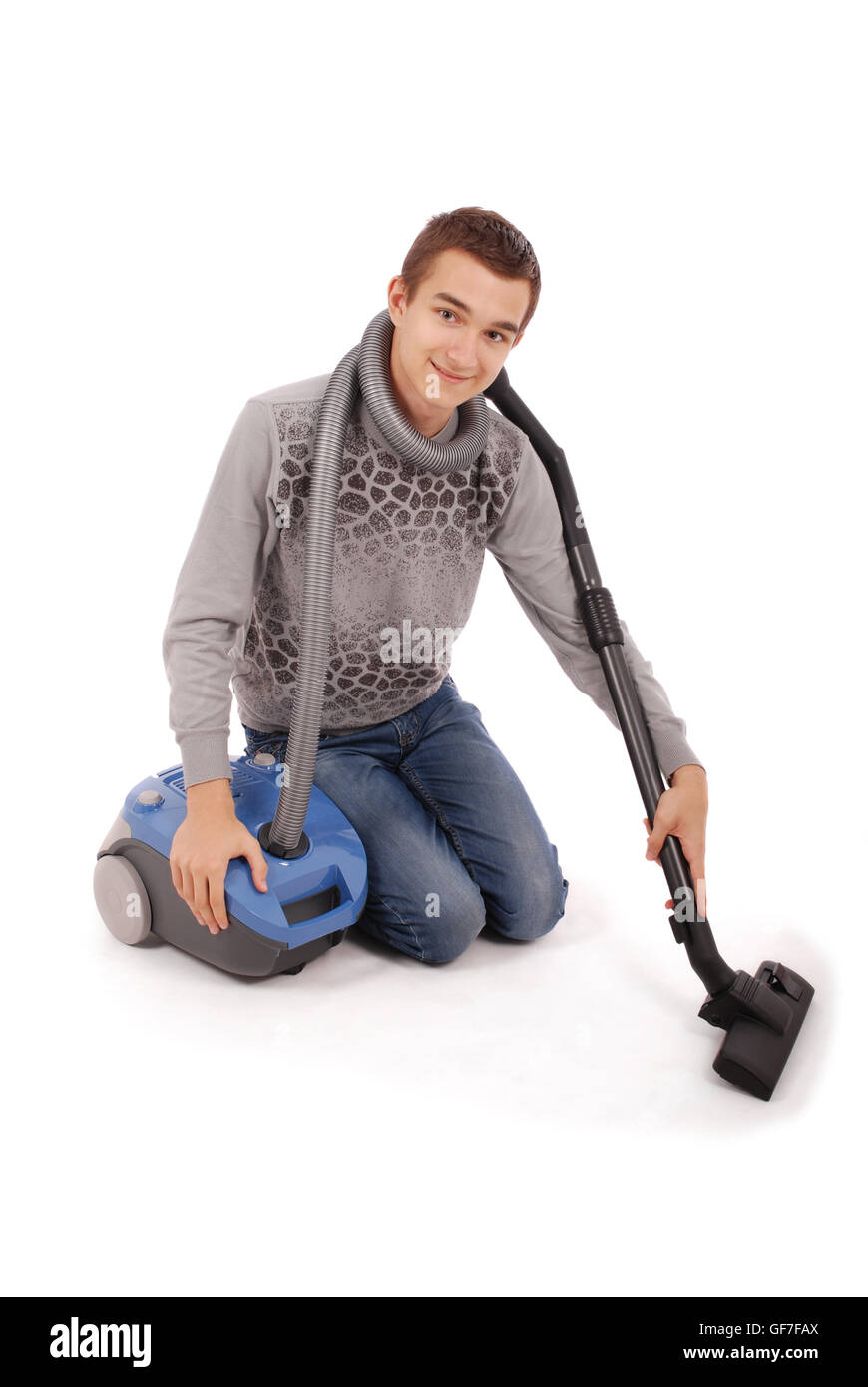 Boy with vacuum cleaner isolated on white background Stock Photo Alamy