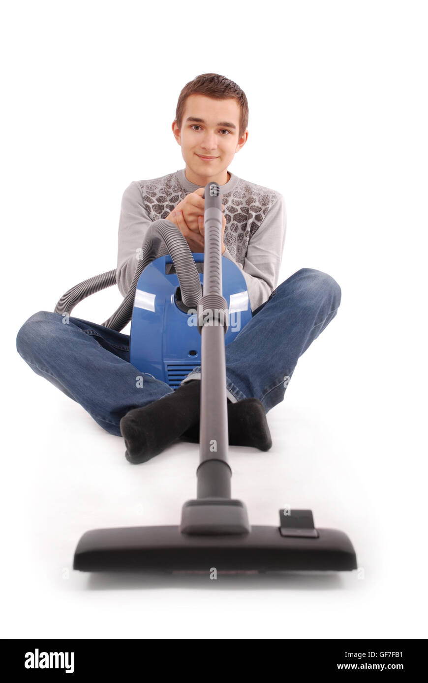 Boy with vacuum cleaner isolated on white background Stock Photo Alamy