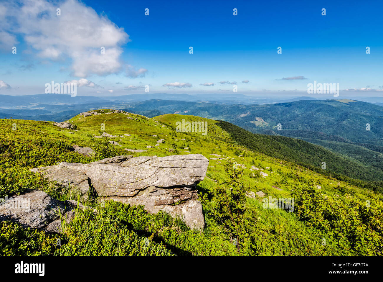 white sharp stones on the hillside on top of mountain range Stock Photo ...