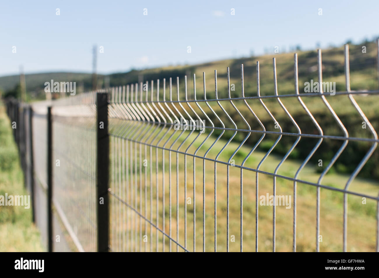 border or private zone with wire fence Stock Photo