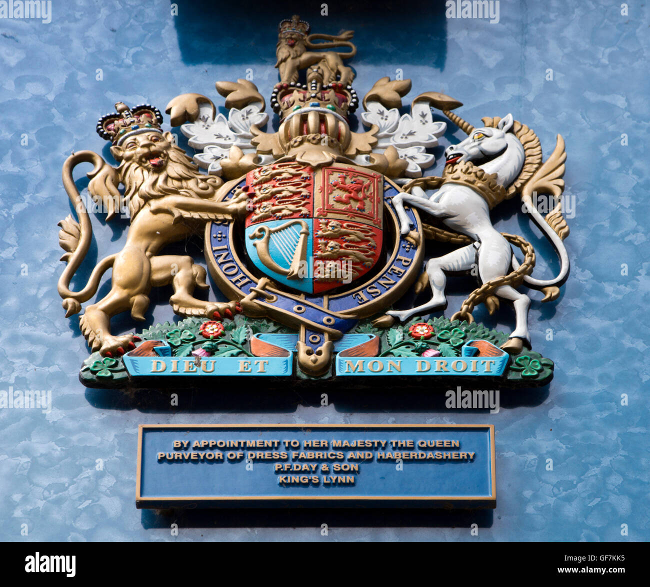 UK, England, Norfolk, King’s Lynn, Broad Street, Royal warrant above Day & son’s fents shop Stock Photo