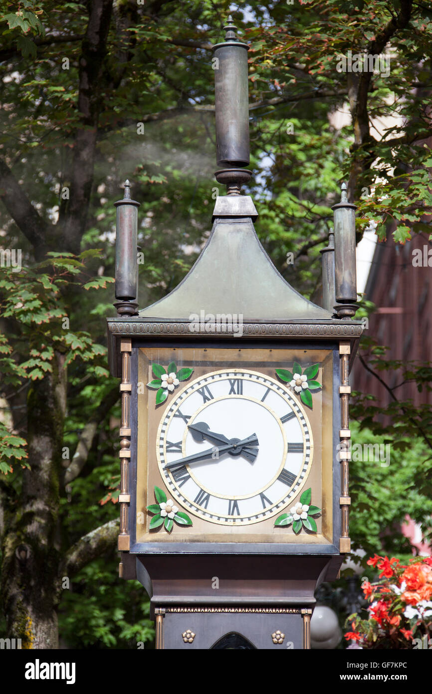 The close view of an original steam clock in the historic district of