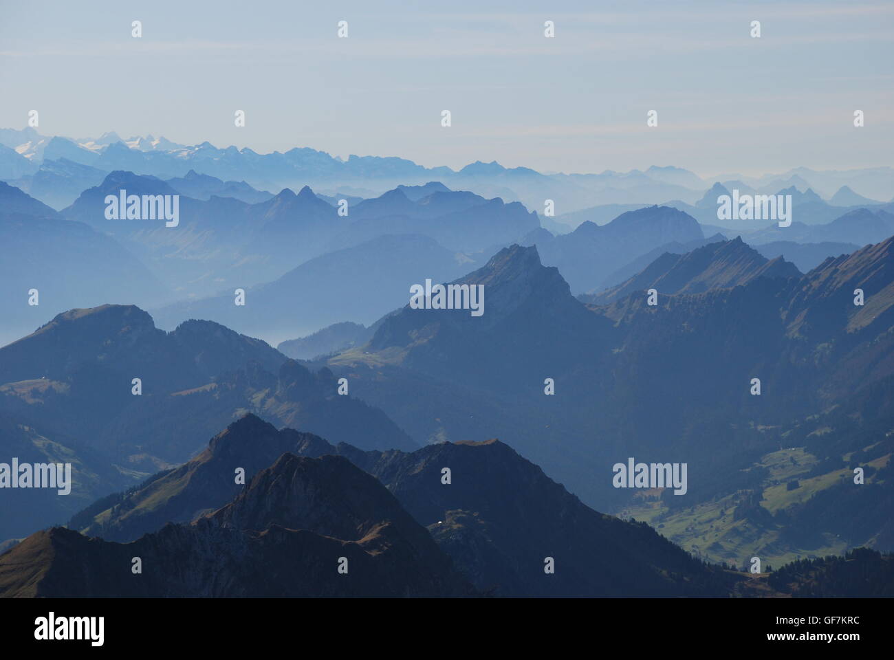 panoramic view of swiss alps in mist Stock Photo - Alamy