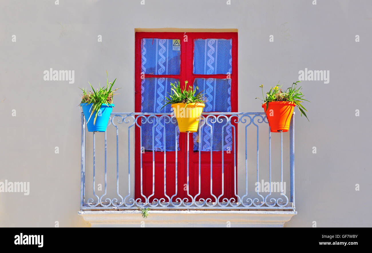 Colorful flowerpots in the window, Floriana, Malta Stock Photo