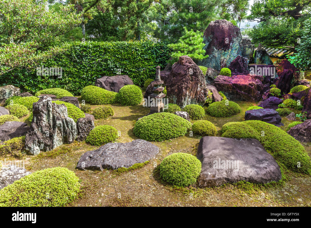 Ikkyu-ji Shuon-an Garden moss-and-rock garden with a small stone pagoda is located around a back corner of the hojo Stock Photo