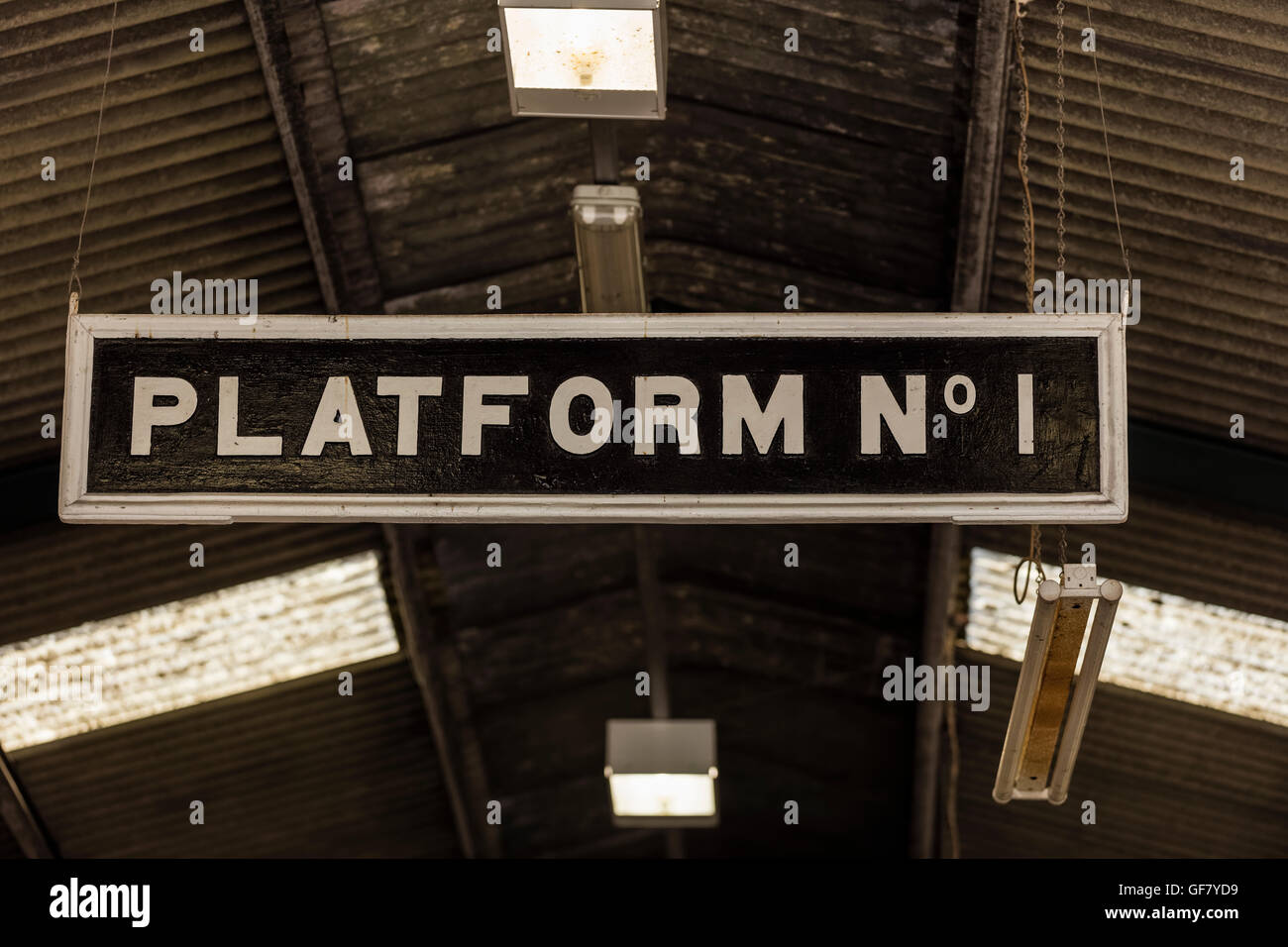 Traditional Platform No 1 sign at the Didcot Railway Centre with the old fashioned ceiling of the station above it Stock Photo