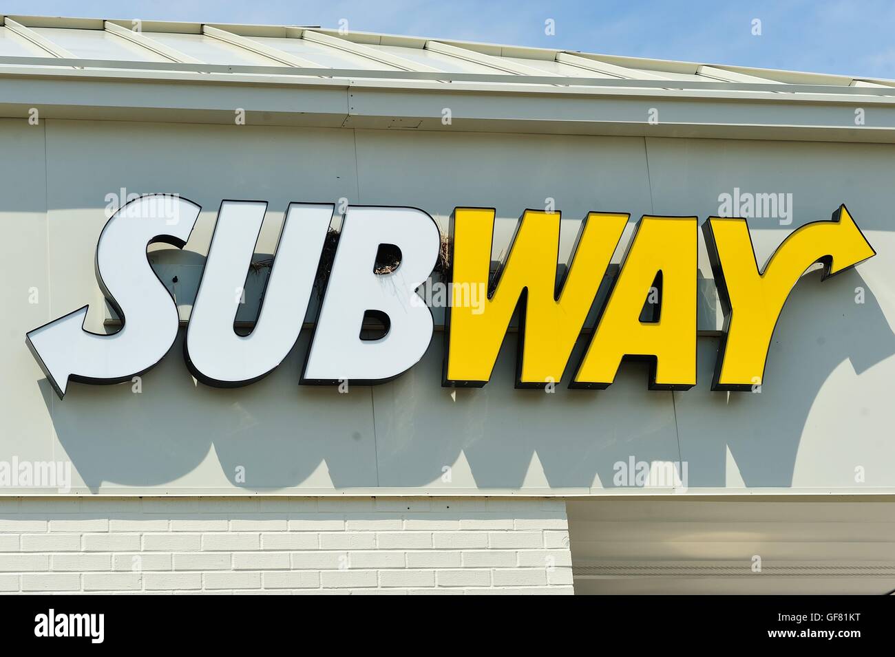 Recognizable national and regional brand locations abound in urban areas such as suburban Chicago like this Subway sign. Stock Photo
