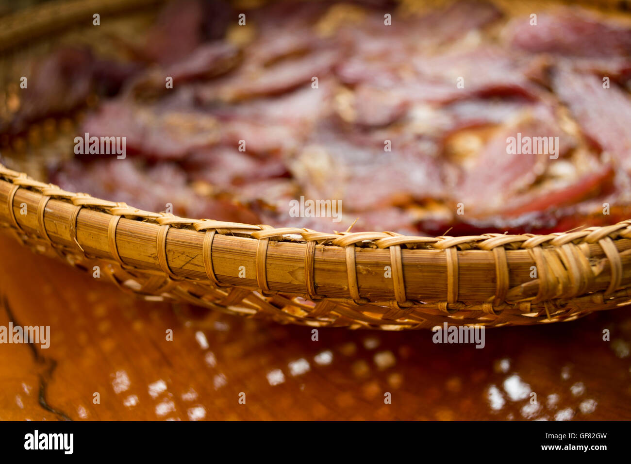Sun dried beef on the threshing basket Stock Photo - Alamy