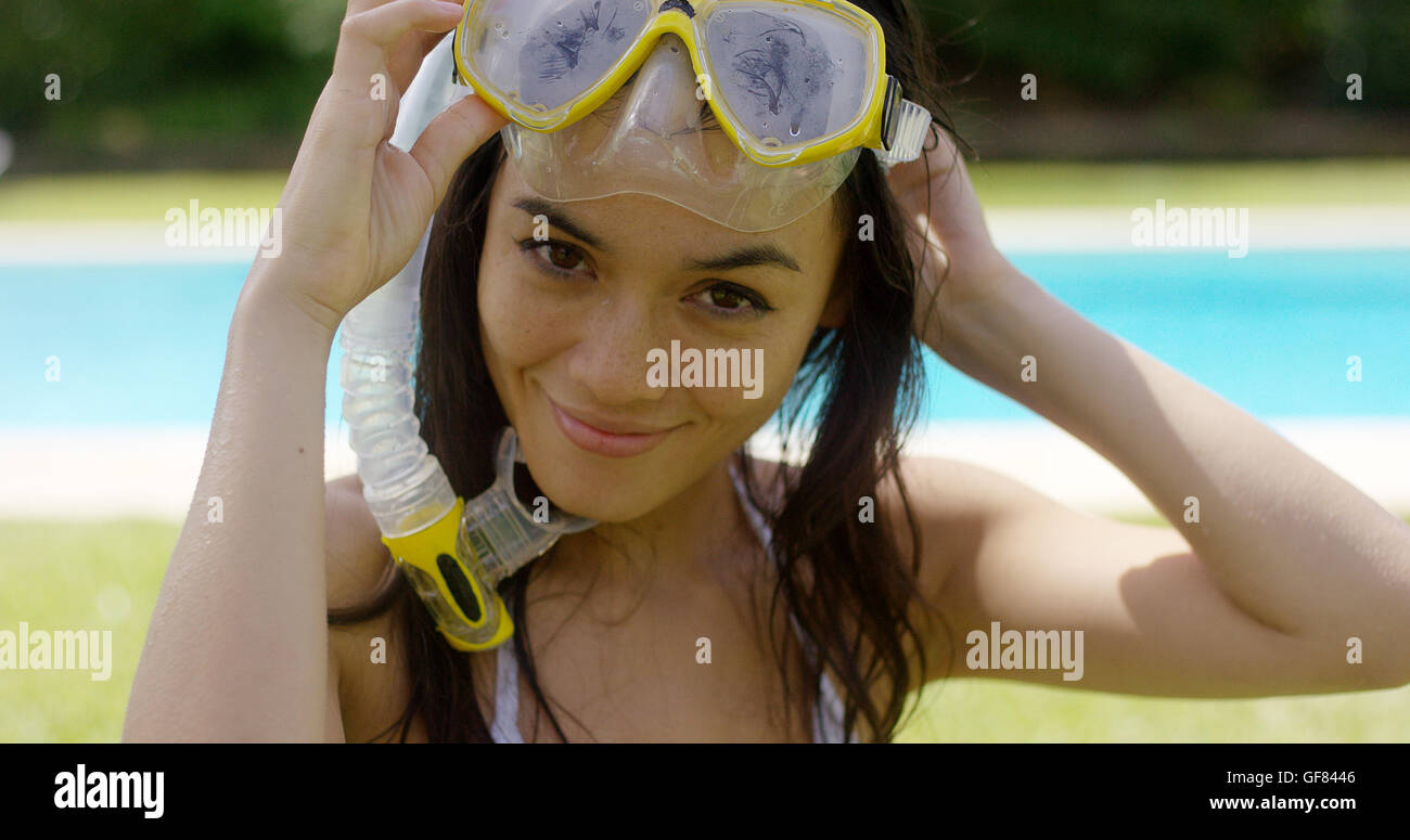 Woman wearing snorkel and swim goggles Stock Photo Alamy