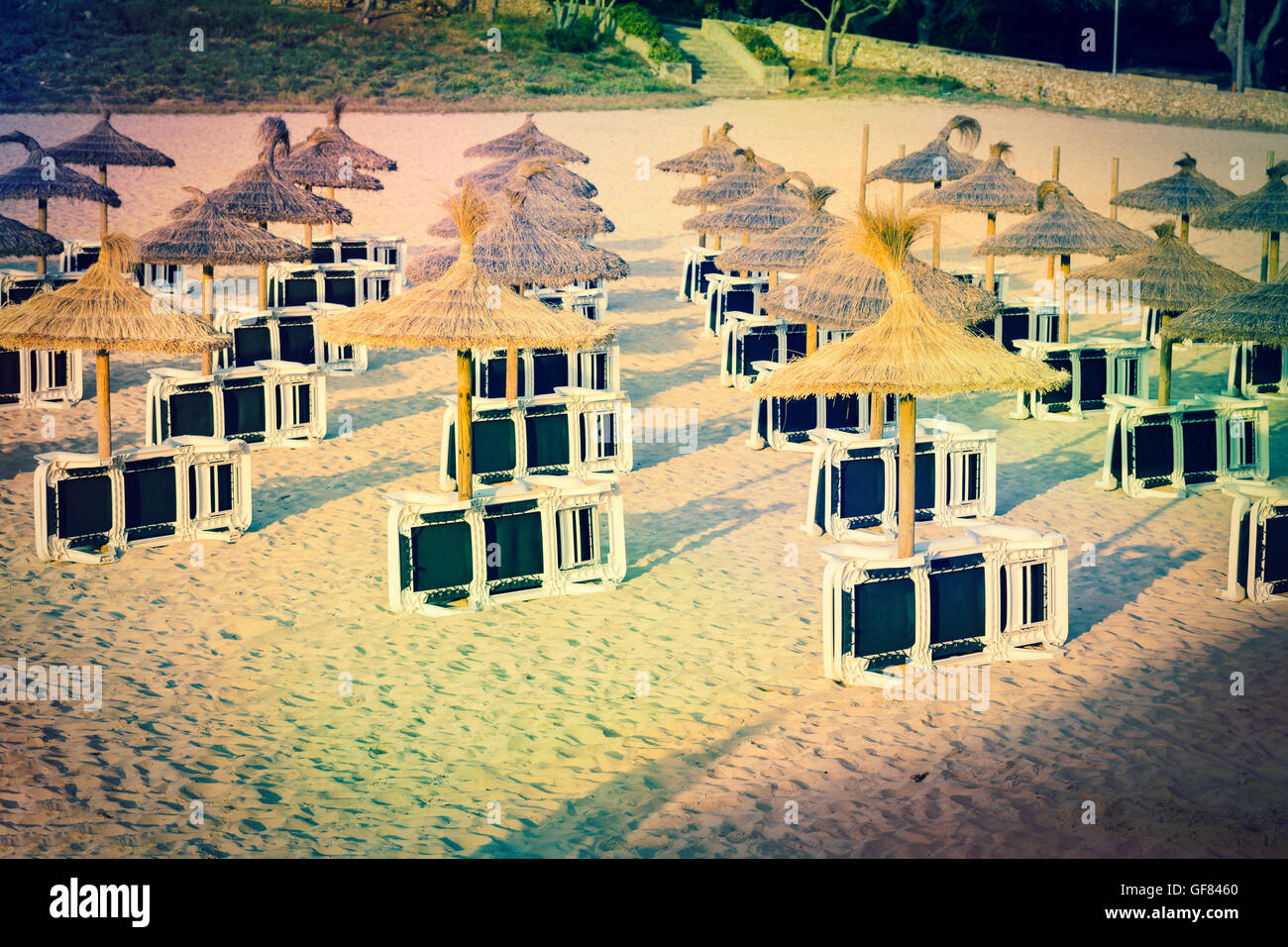 Sun loungers on a sandy beach Stock Photo