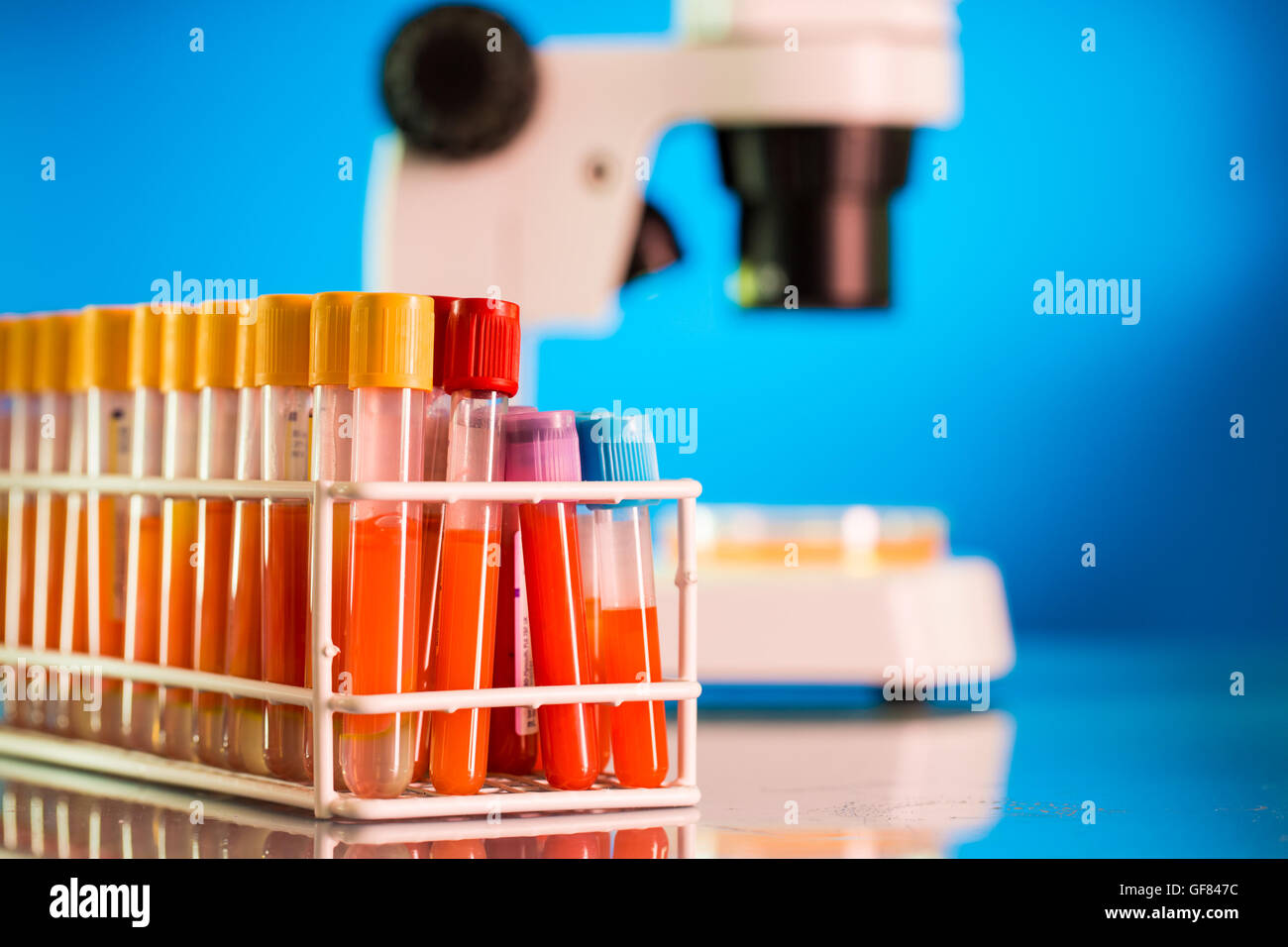 Laboratory work place with microscope, test tube and pipettes. Stock Photo