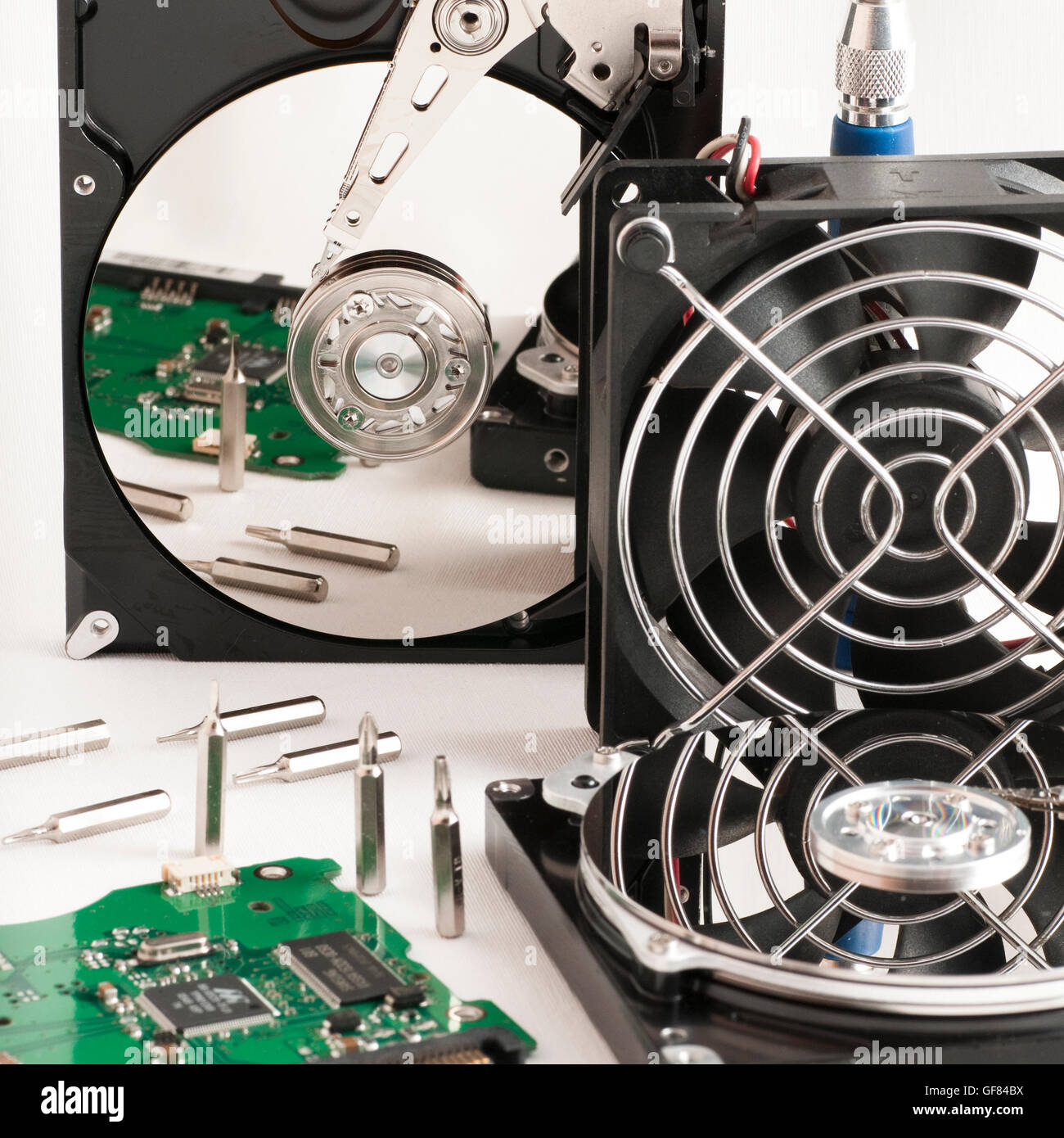 details of hard disk drive open and a fan Stock Photo Alamy