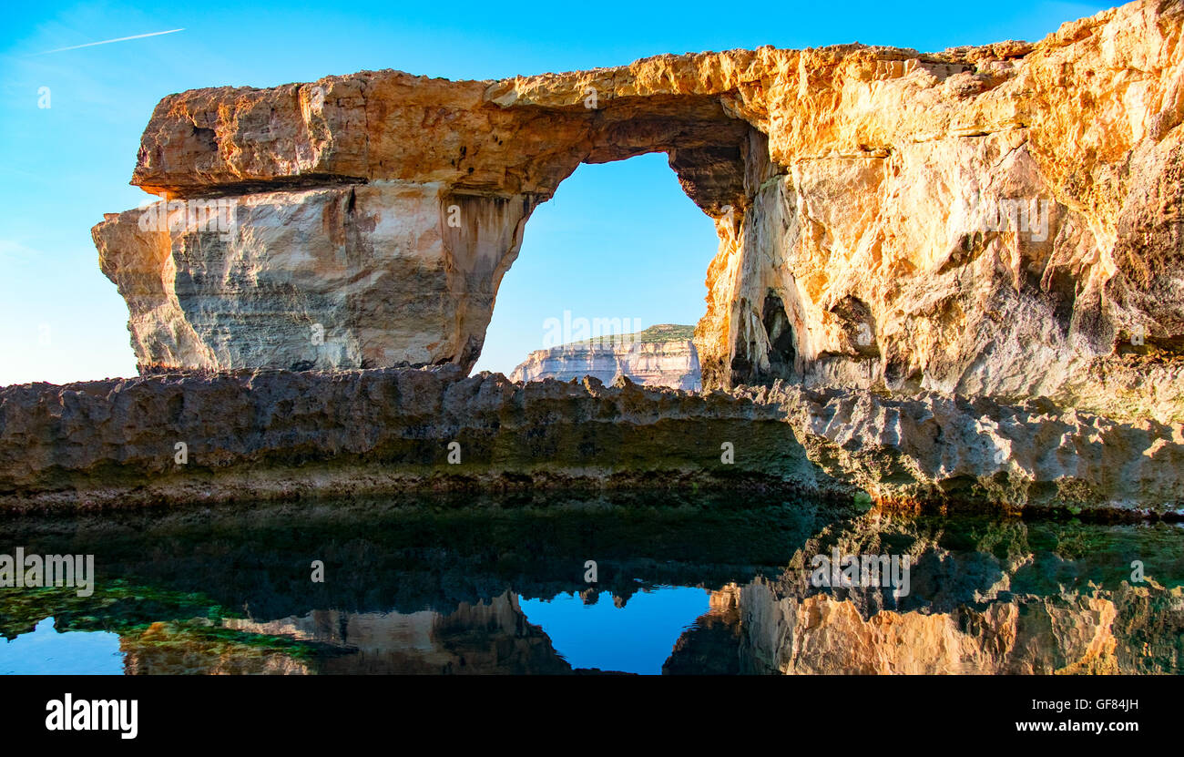 Azure Window, natural arch, famous landmark and popular tourist spot, on Gozo island, Malta, Stock Photo