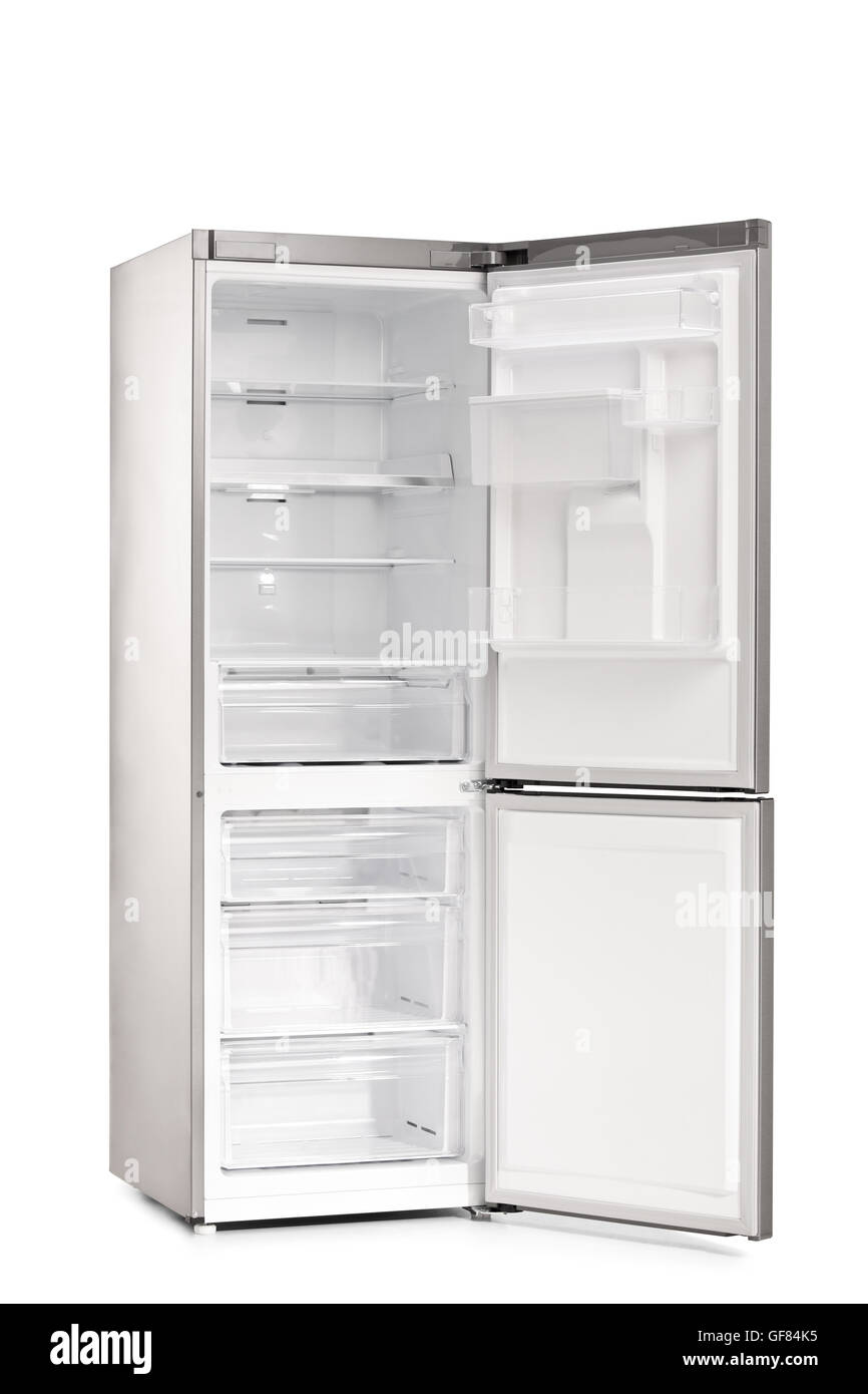 Vertical shot of a new empty and open refrigerator isolated on white background Stock Photo